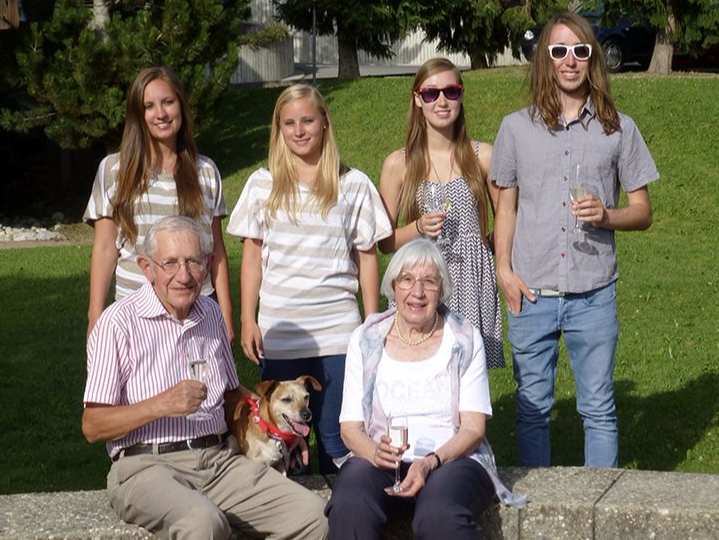 Grandparents with dog and grandkids